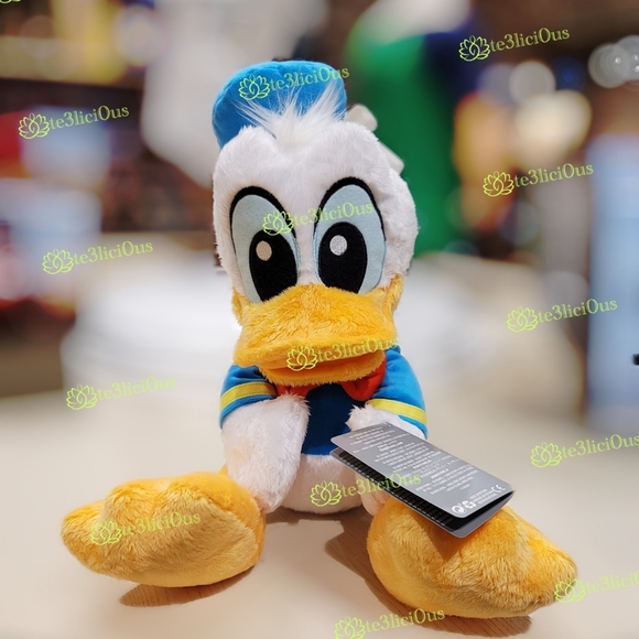 Disney Accessories - DISNEY PARKS DONALD DUCK BIG FEET PLUSH